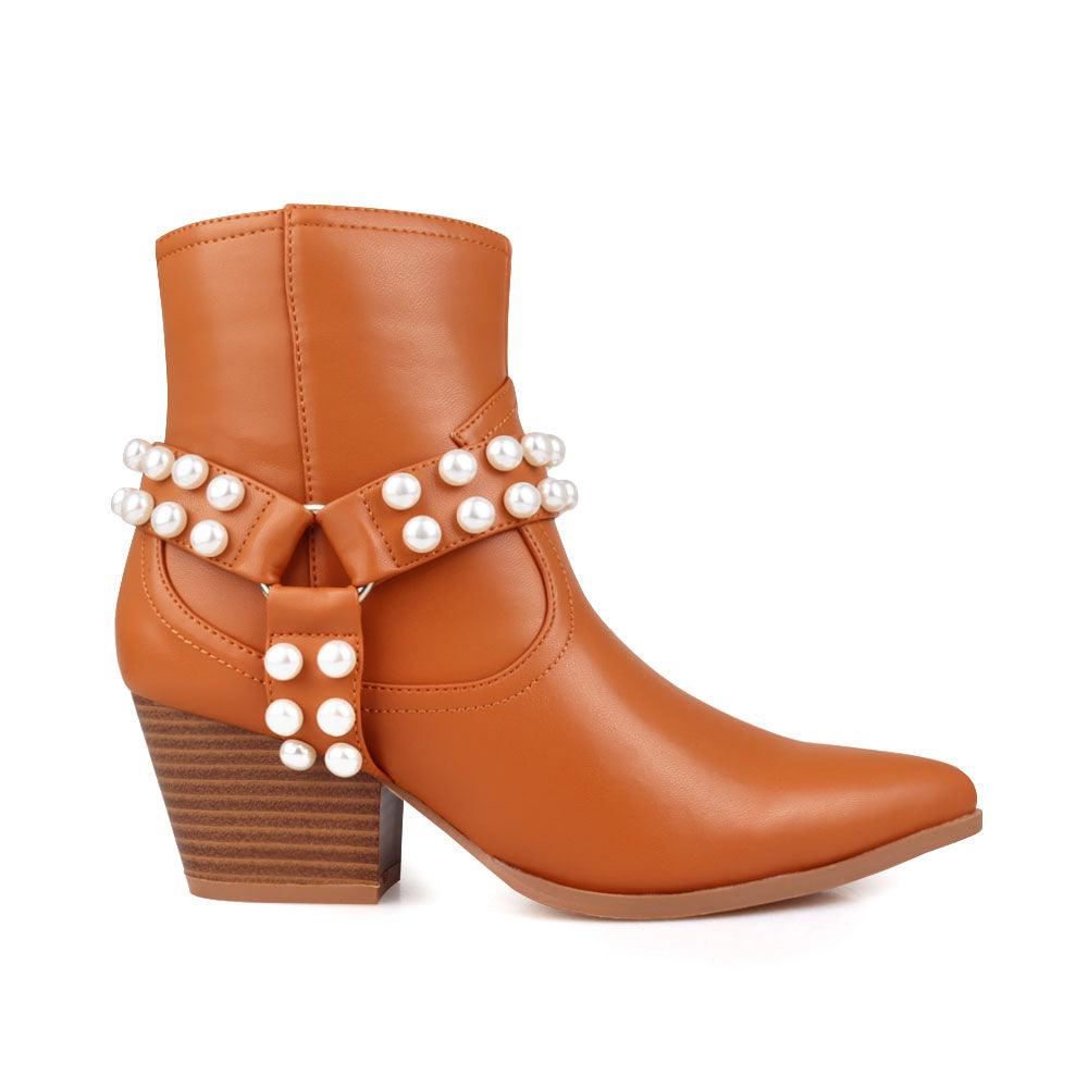 Shoes in tan with beaded ankle and pointed toe.