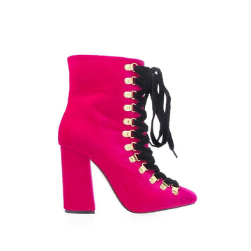 Pink colored ankle high boots with block heels, lace up design and side zipper closure