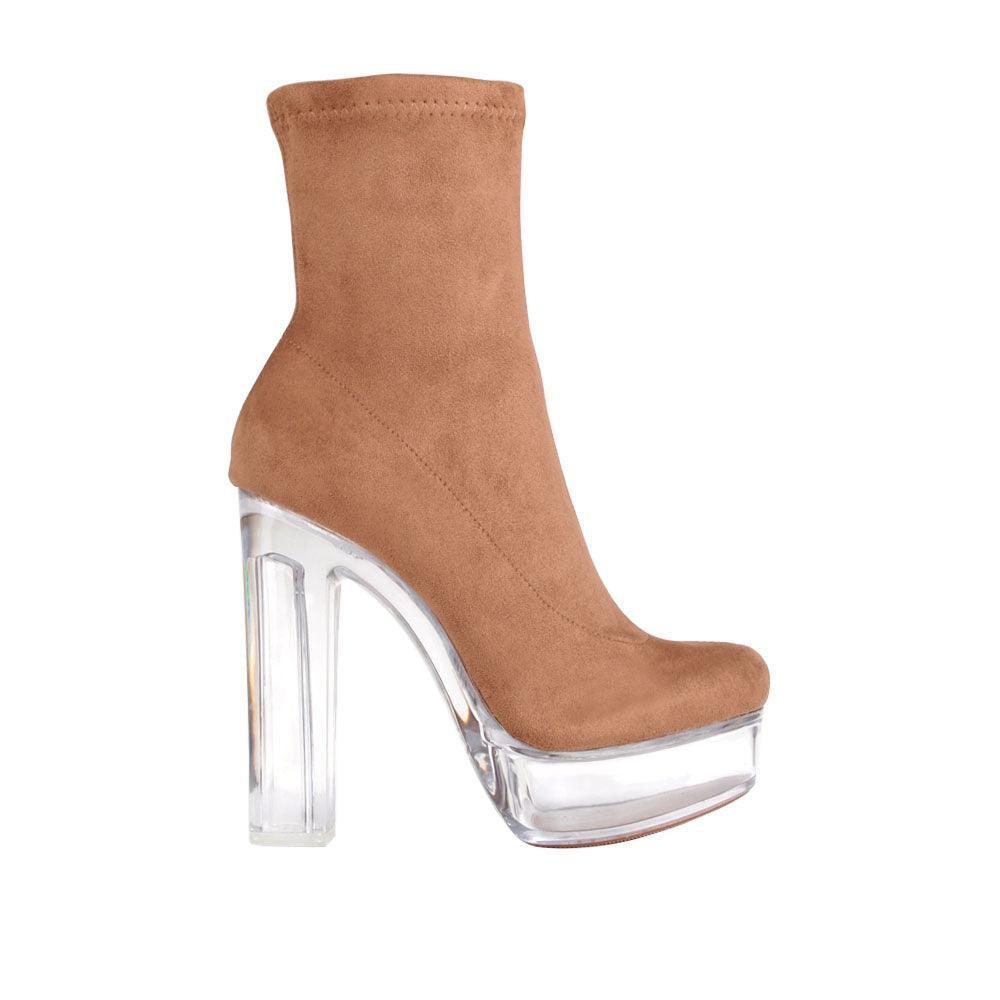 Nude colored platform boots with translucent block heels and side zipper clasp