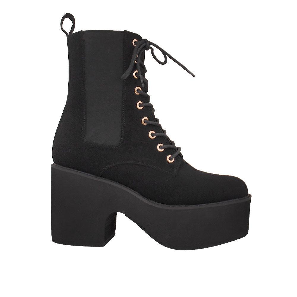 Black platform boots with lace-up front and slip-on style.