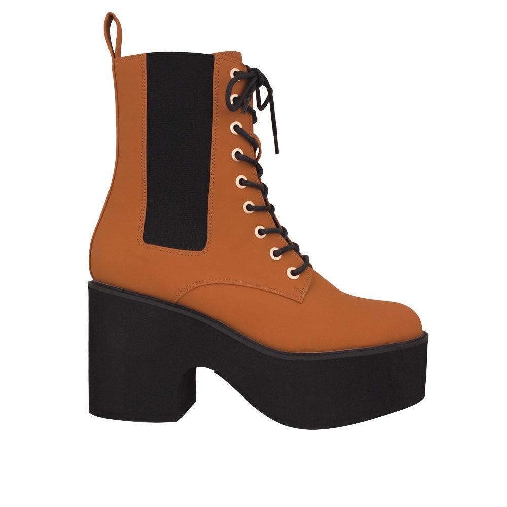 Black platform boots with camel upper, lace-up front and slip on design