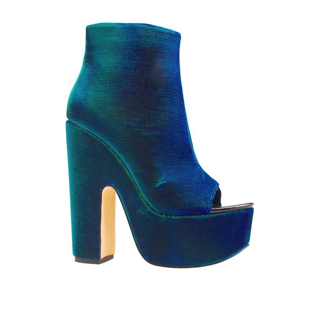 Green open toe women's heel-side view