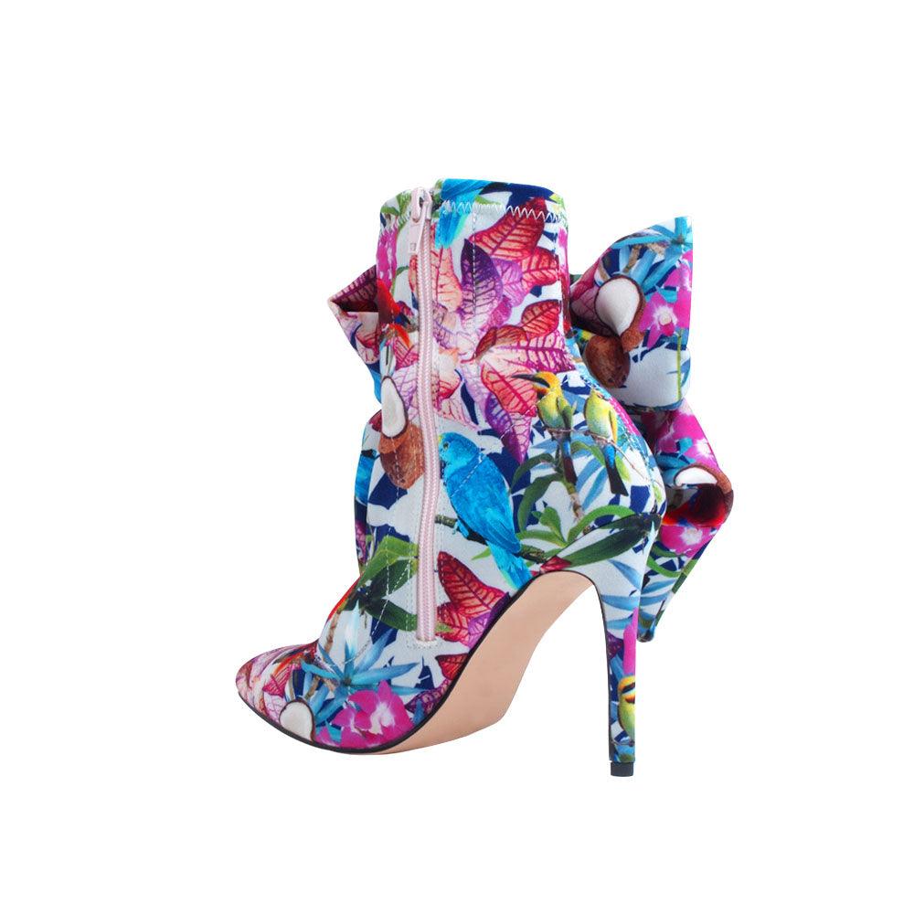 Multi colour floral lycra upper women's boot heels with bow-posterior view