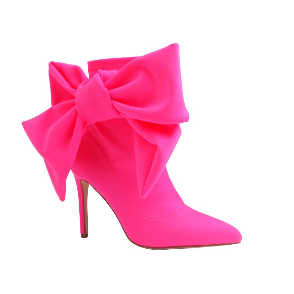 Neon pink lycra upper women's boot heels with bow-corner view