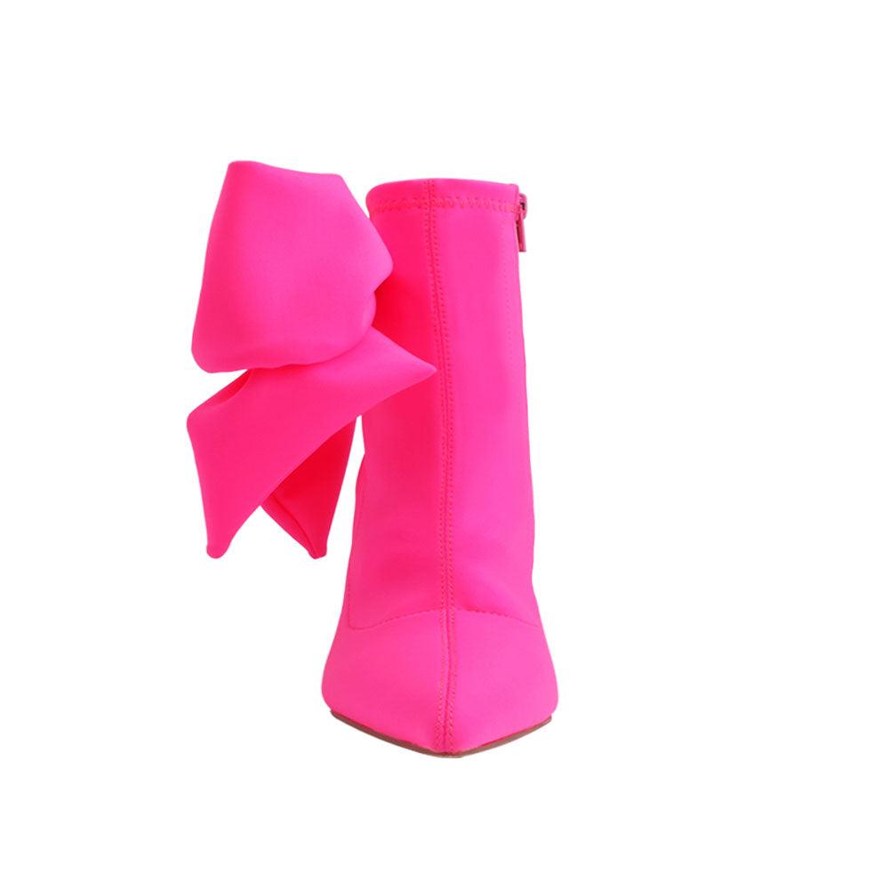 Neon pink lycra upper women's boot heels with bow-front view