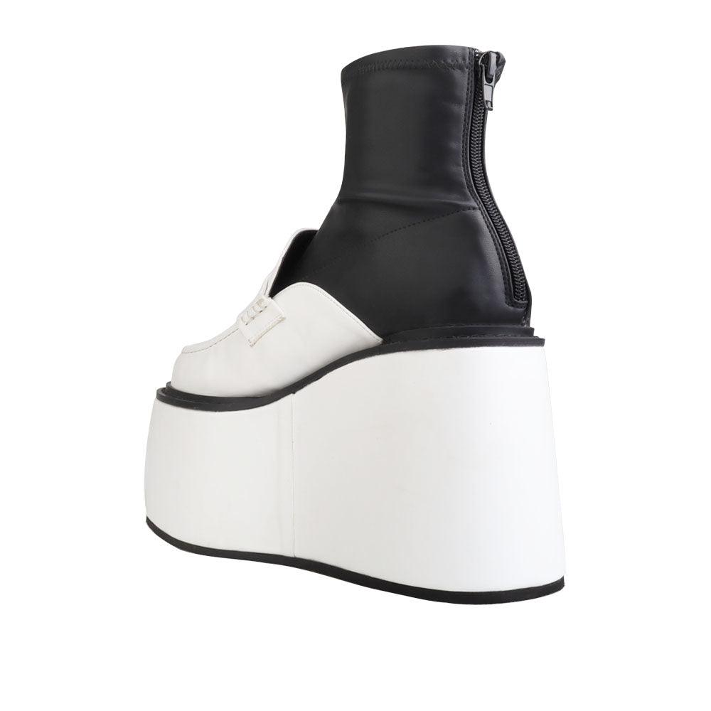 Black/white women's platform booties-posterior view