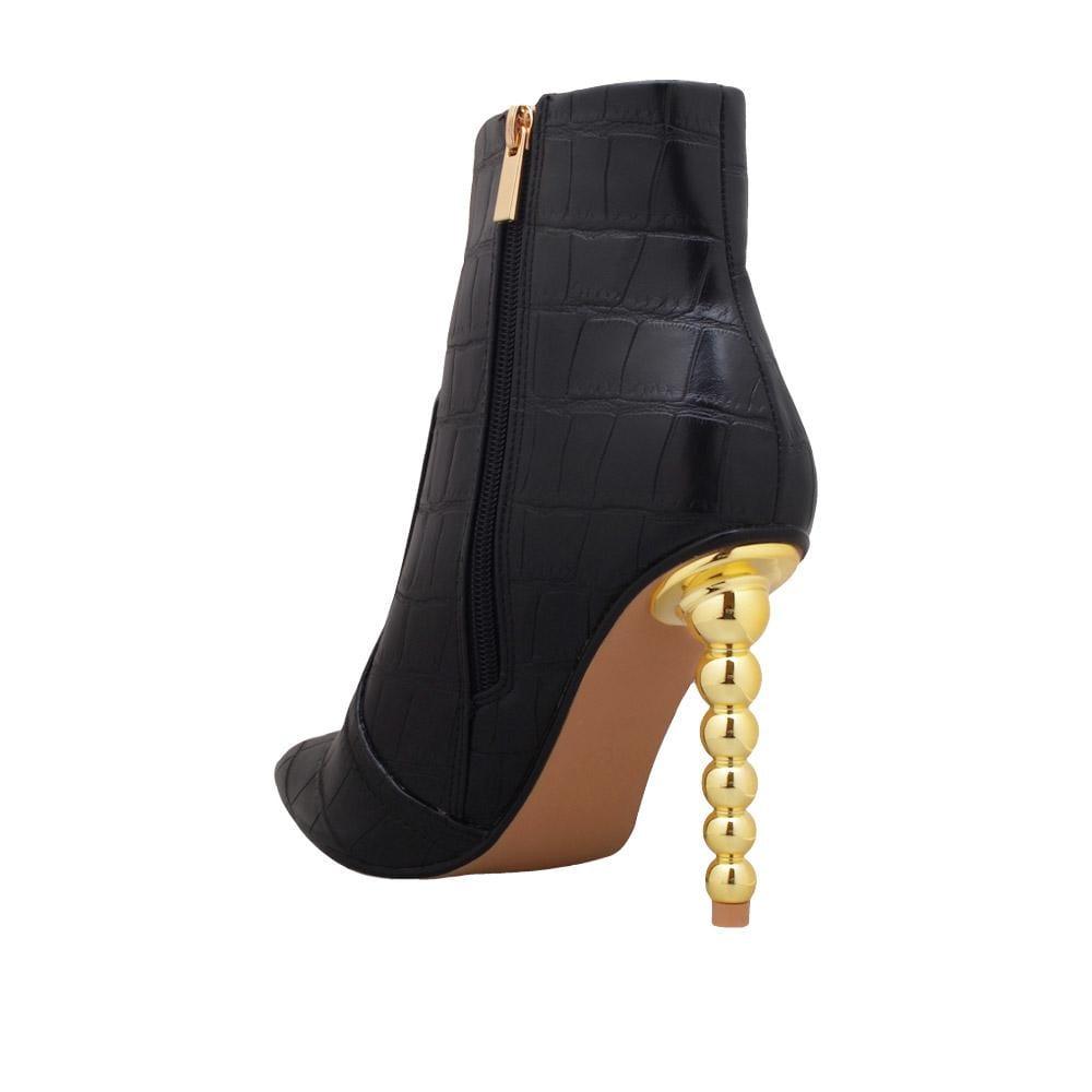 Women's eather boots with rounded sculptural heel in black-posterior view