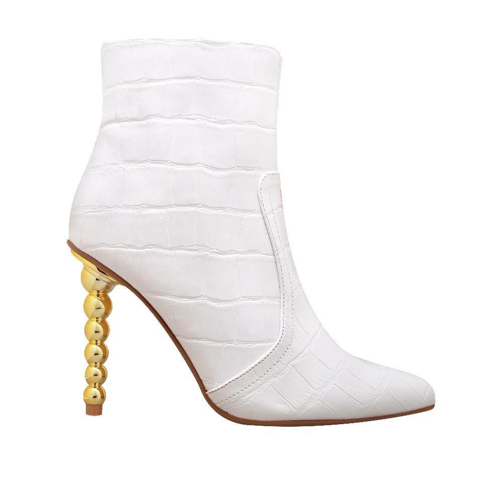 Women's leather boots with rounded sculptural heel in white-side view