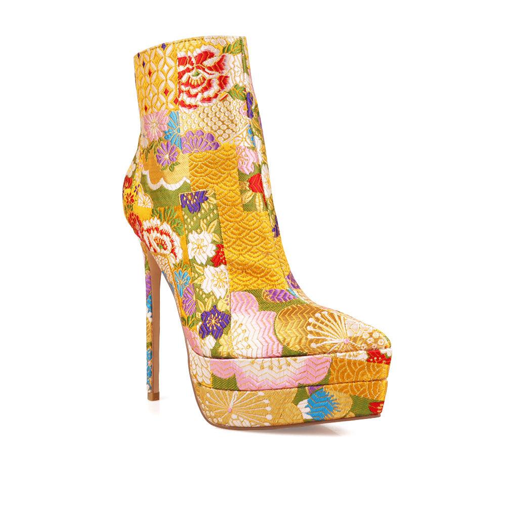 Stiletto women heel with yellow floral motive and vegan suede-corner view