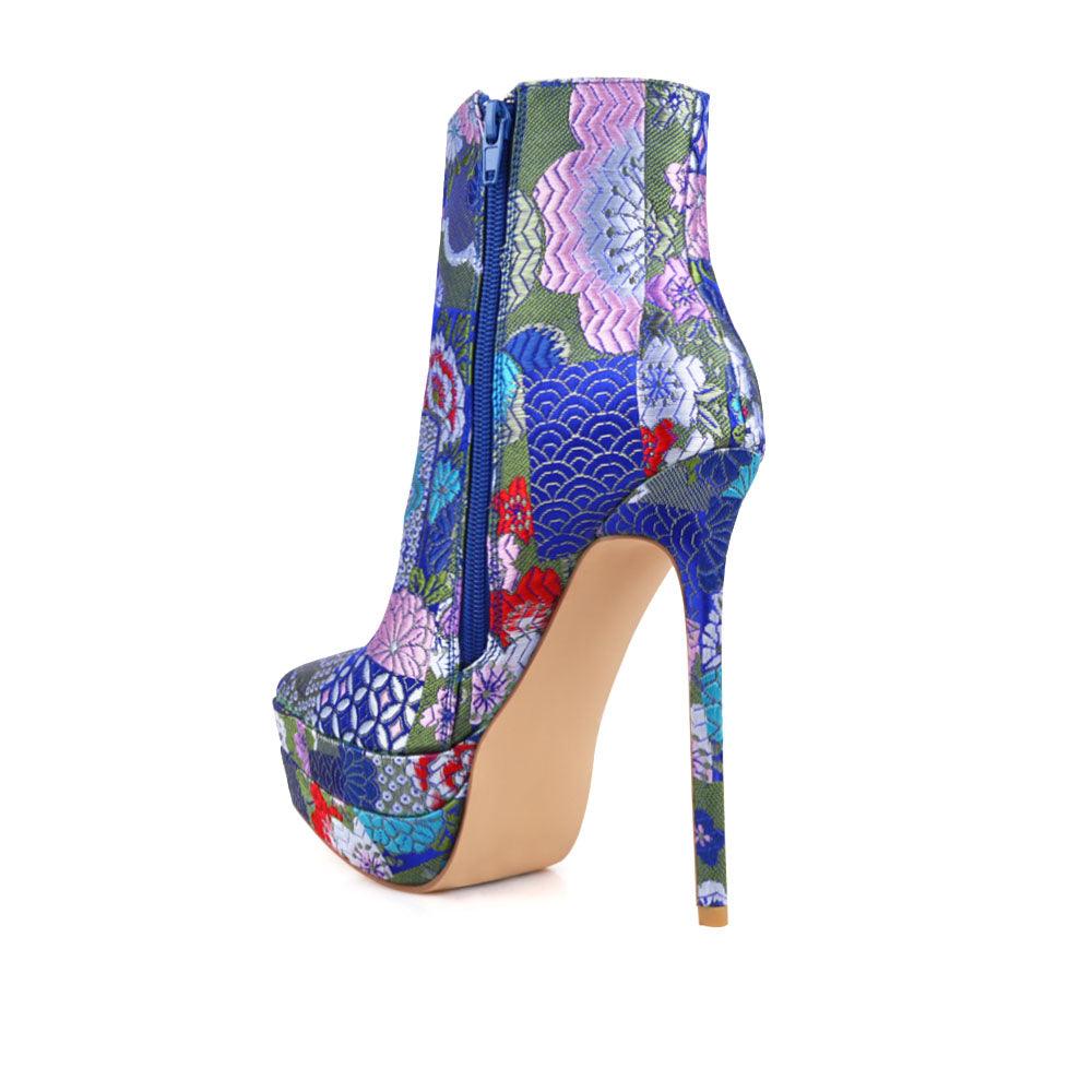 Stiletto women heel with turquoise floral motive and vegan suede-posterior view