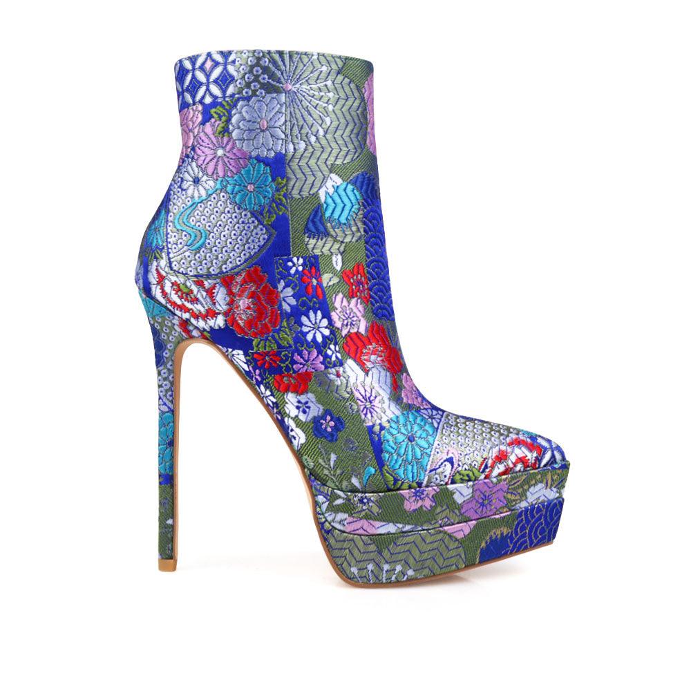 Stiletto women heel with turquoise floral motive and vegan suede-side view