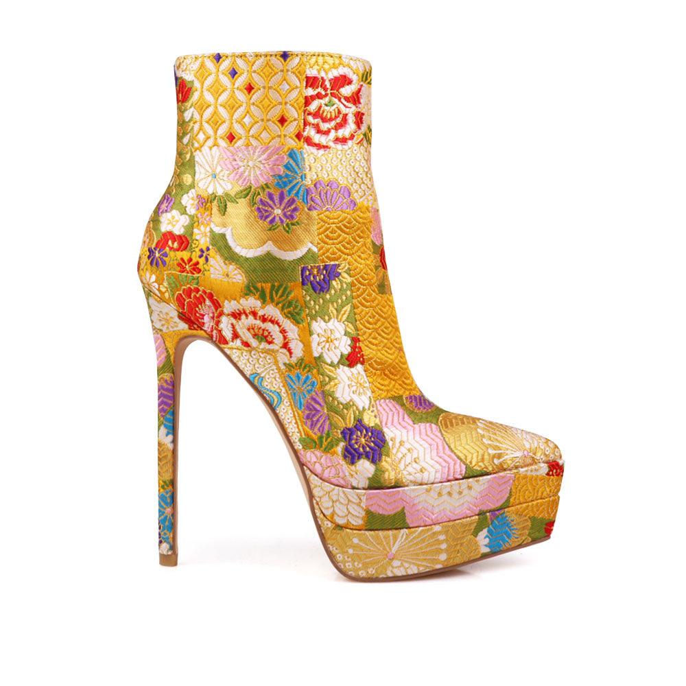 Stiletto women heel with yellow floral motive and vegan suede-side view