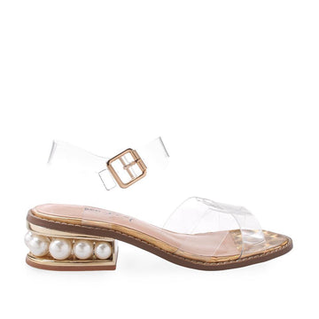golden-colored women's flat shoes with clear straps and buckle-side view