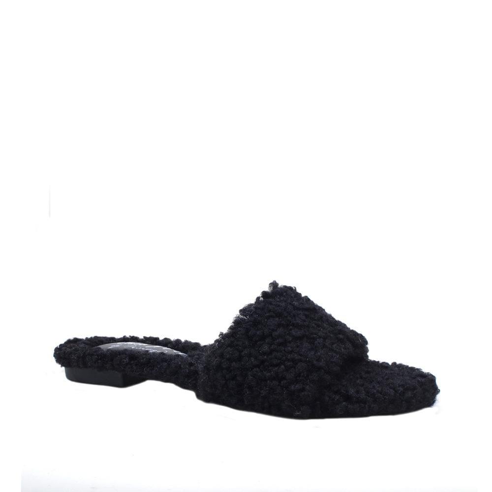 Black colored women's flats with shearling upper-corner view