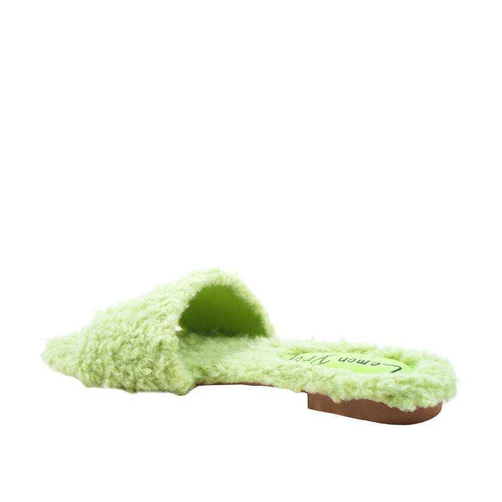 Women's green colored flats with shearling uppers-posterior view