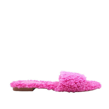 Women's fuchsia colored flats with shearling uppers-side view