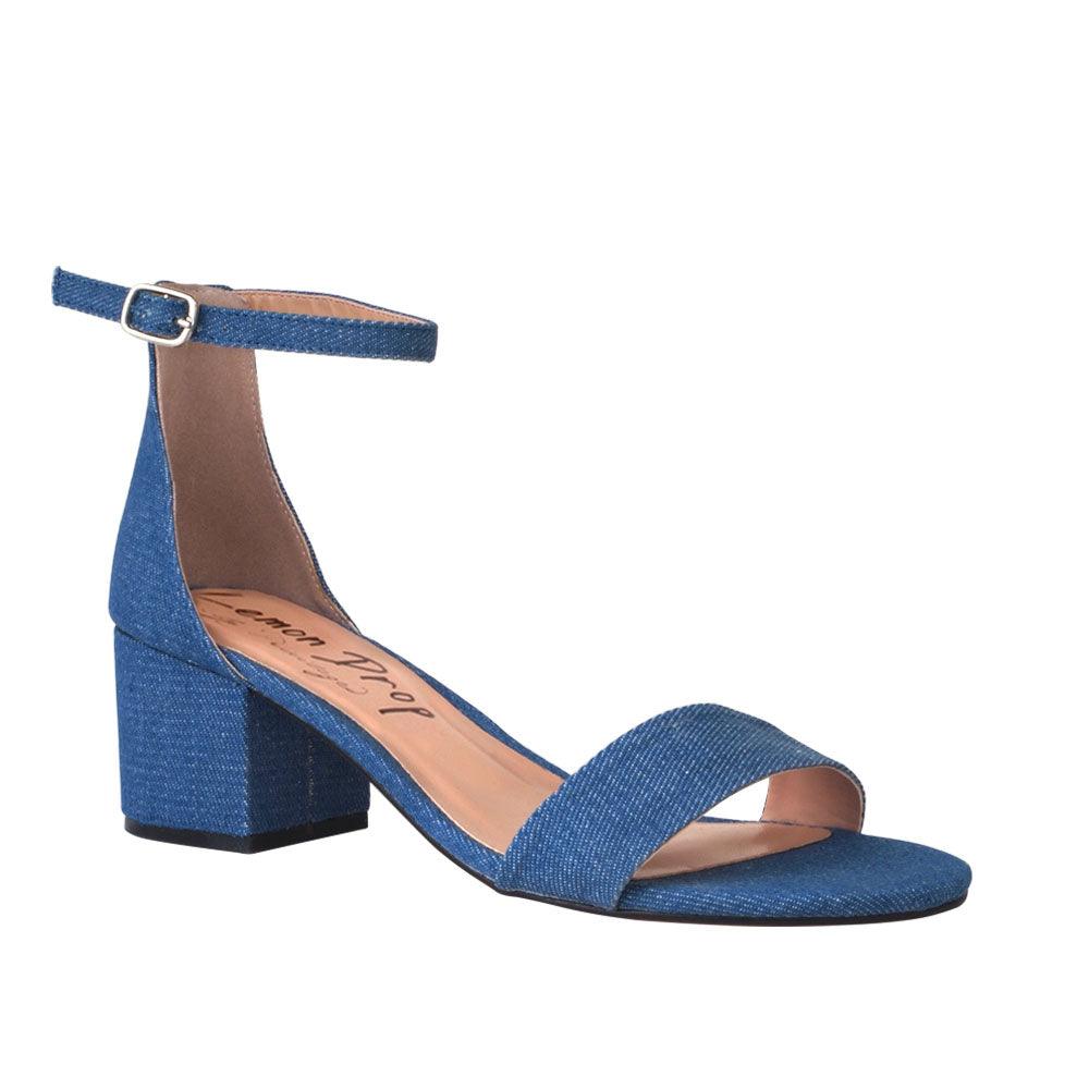 Heel flats in denim-color with a buckle ankle closure and a strapped open toe-corner view