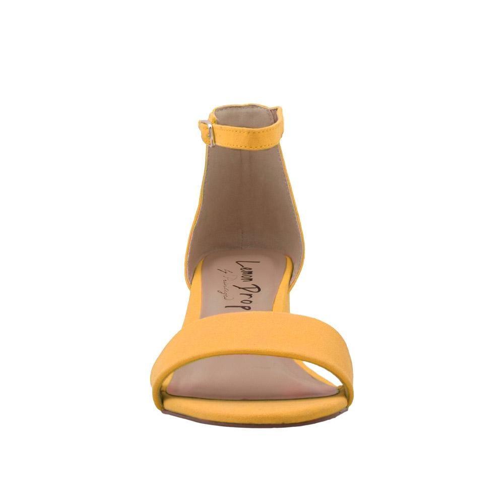 Yellow-colored heel flats with a buckle ankle clasp and strapped open toe-front view