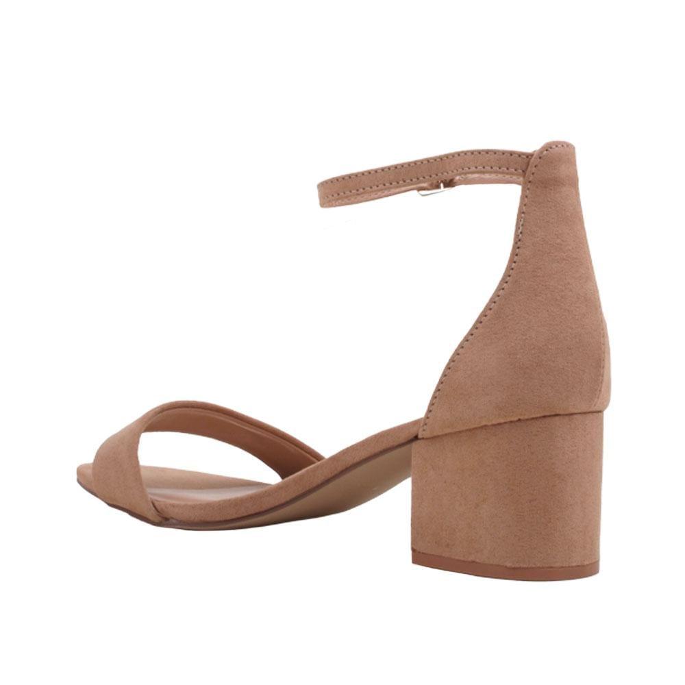 Tan heeled flats with a buckle ankle closure and a strapped open toe-posterior view