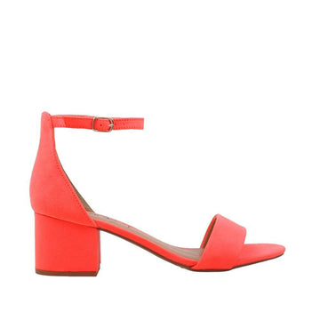 Orange-colored heel flats with a buckle ankle closure and a strapped open toe-side view