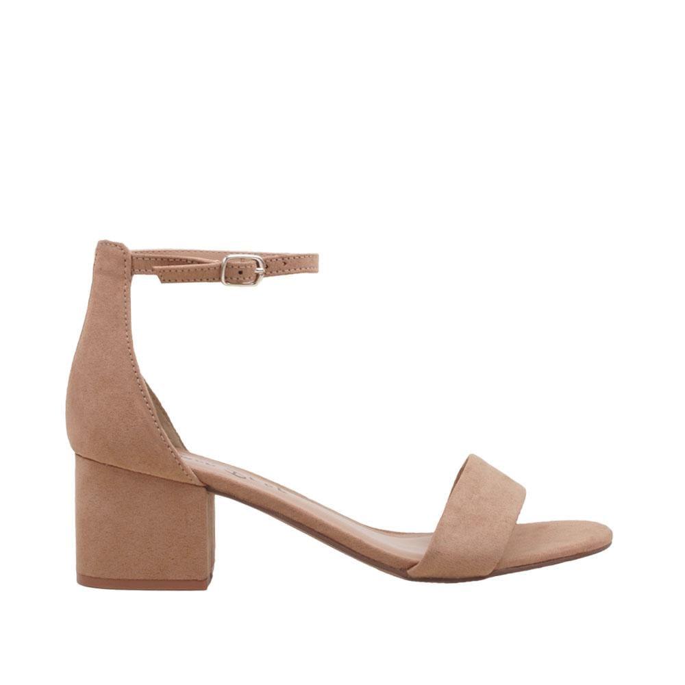 Tan heeled flats with a buckle ankle closure and a strapped open toe-side view