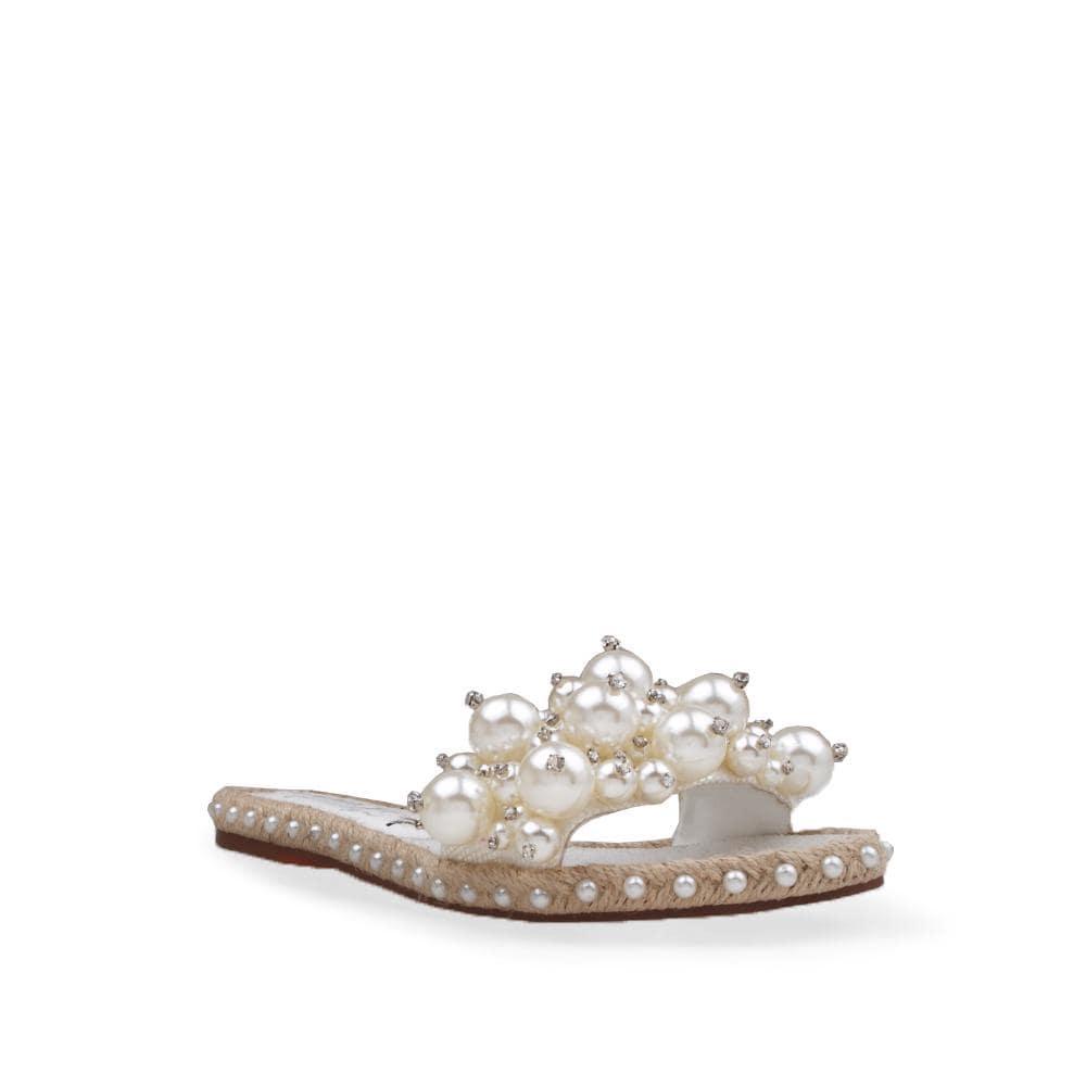 White women flats with pearl embellished upper and jute base lining-corner view