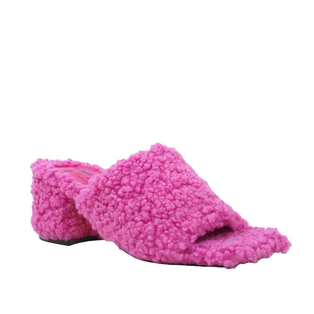 Pink colored women flats covered with faux fur-corner view