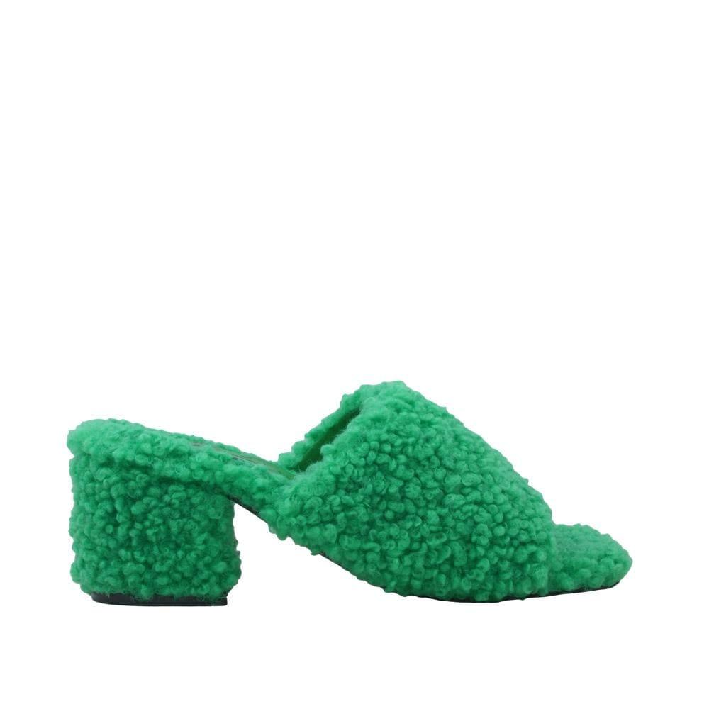 Green colored women flats covered with faux fur-side view