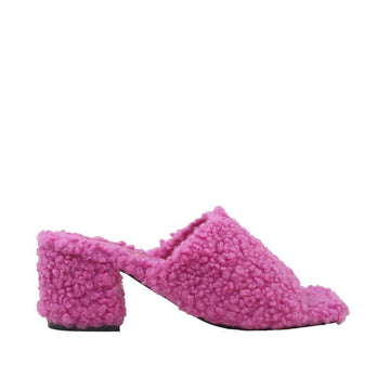 Pink colored women flats covered with faux fur-side view