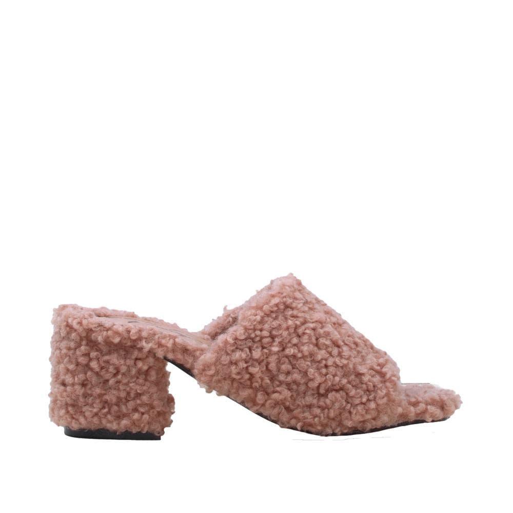 Tan colored women flats covered with faux fur-side view