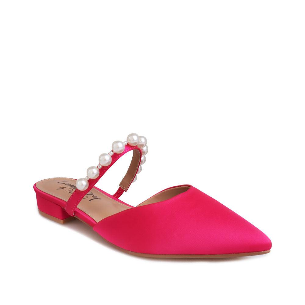 Women's slip ons in fuchsia with white pearls strap-corner view