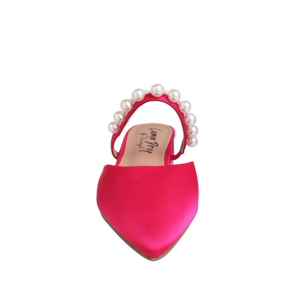 Women's slip ons in fuchsia with white pearls strap-front view