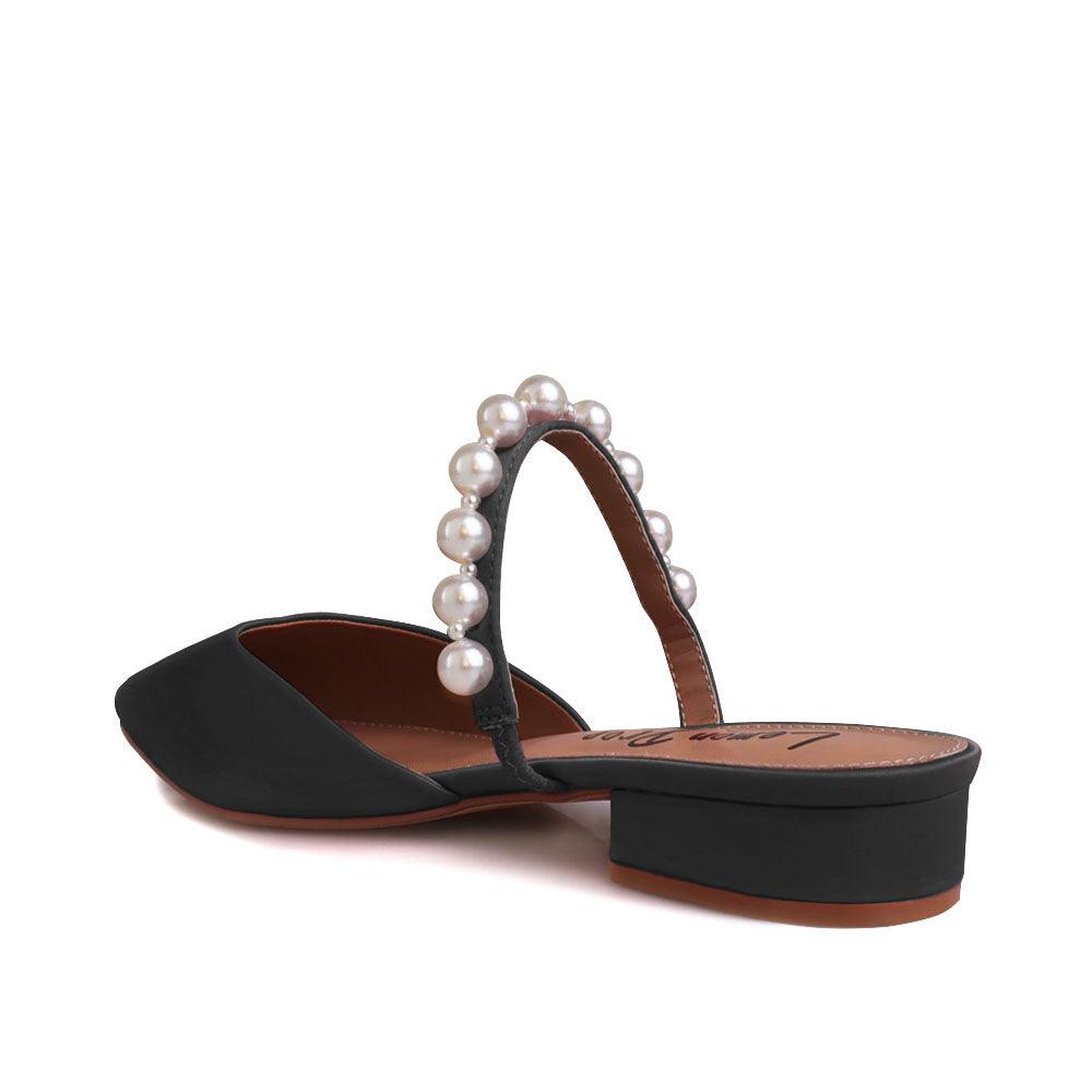 Women's slip ons in black with white pearls strap-posterior view