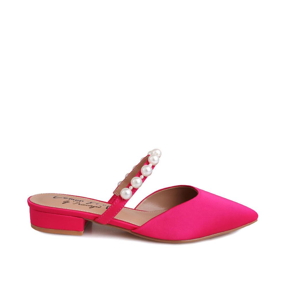 Women's slip ons in fuchsia with white pearls strap-side view