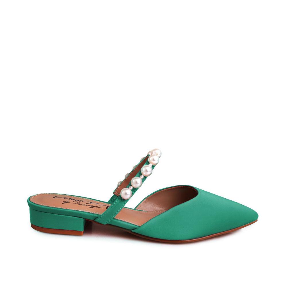 Women's slip ons in green with white pearls strap-side view