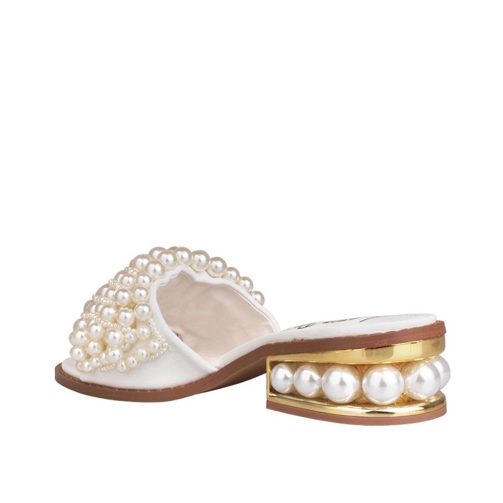 White women heels with pearl embellishments on upper and heel-posterior view