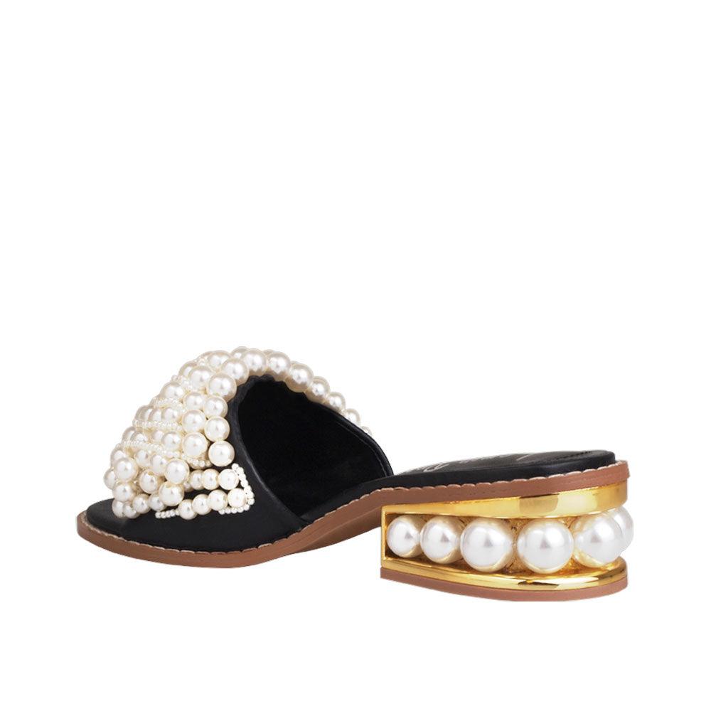 Black women heels with pearl embellishments on upper and heel-posterior view