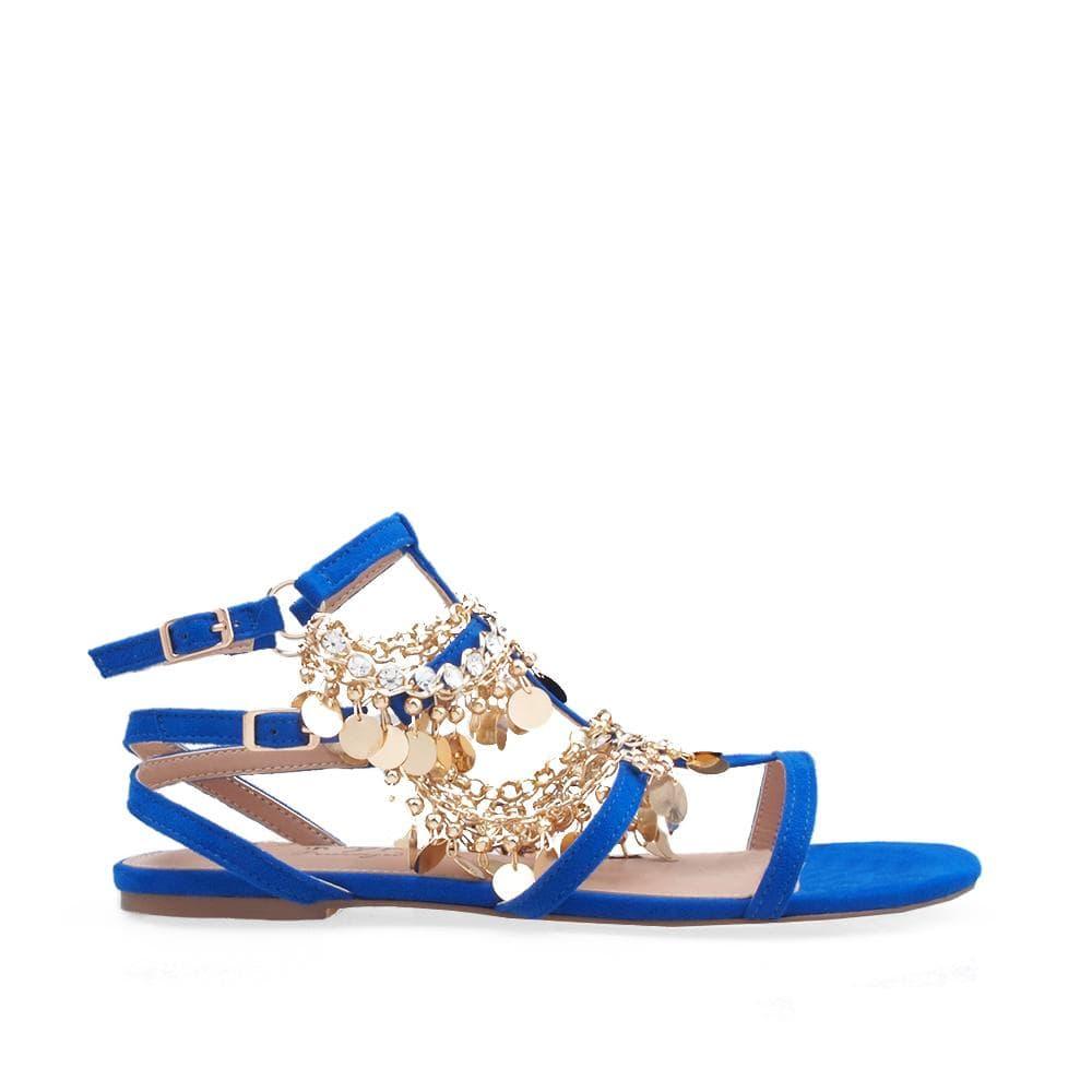 Women flat shoes with rhinestones and metallic gold charms in cobalt