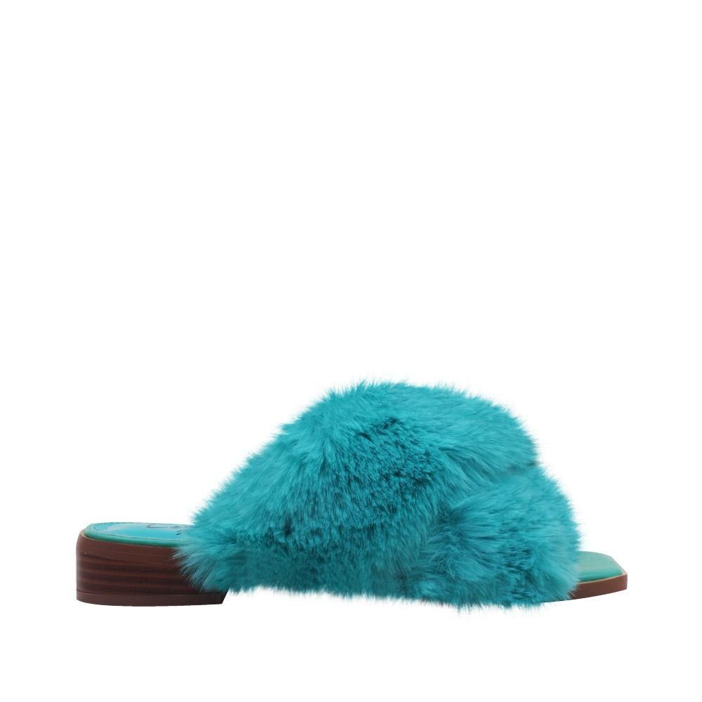 Women slip ons with faux fur accents in aqua