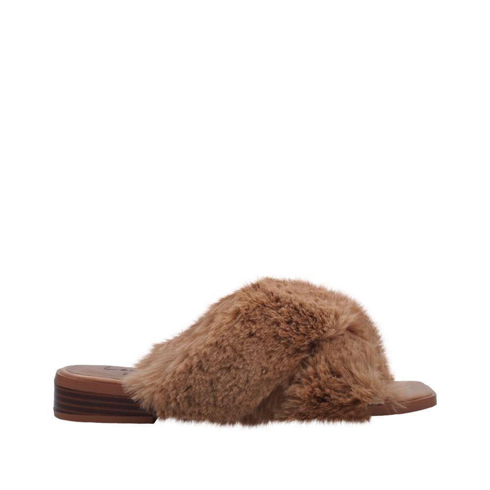 Women slip ons with faux fur accents in tan