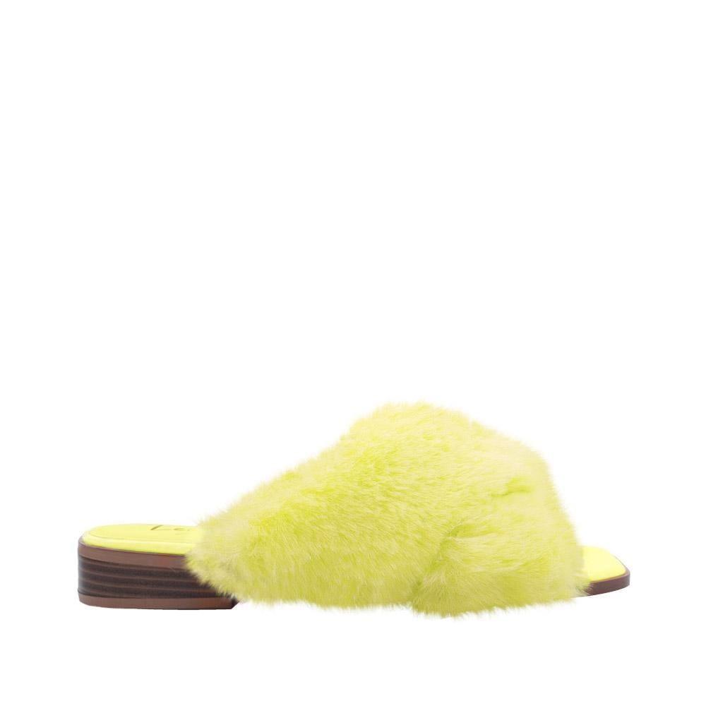 Women slip ons with faux fur accents in yellow