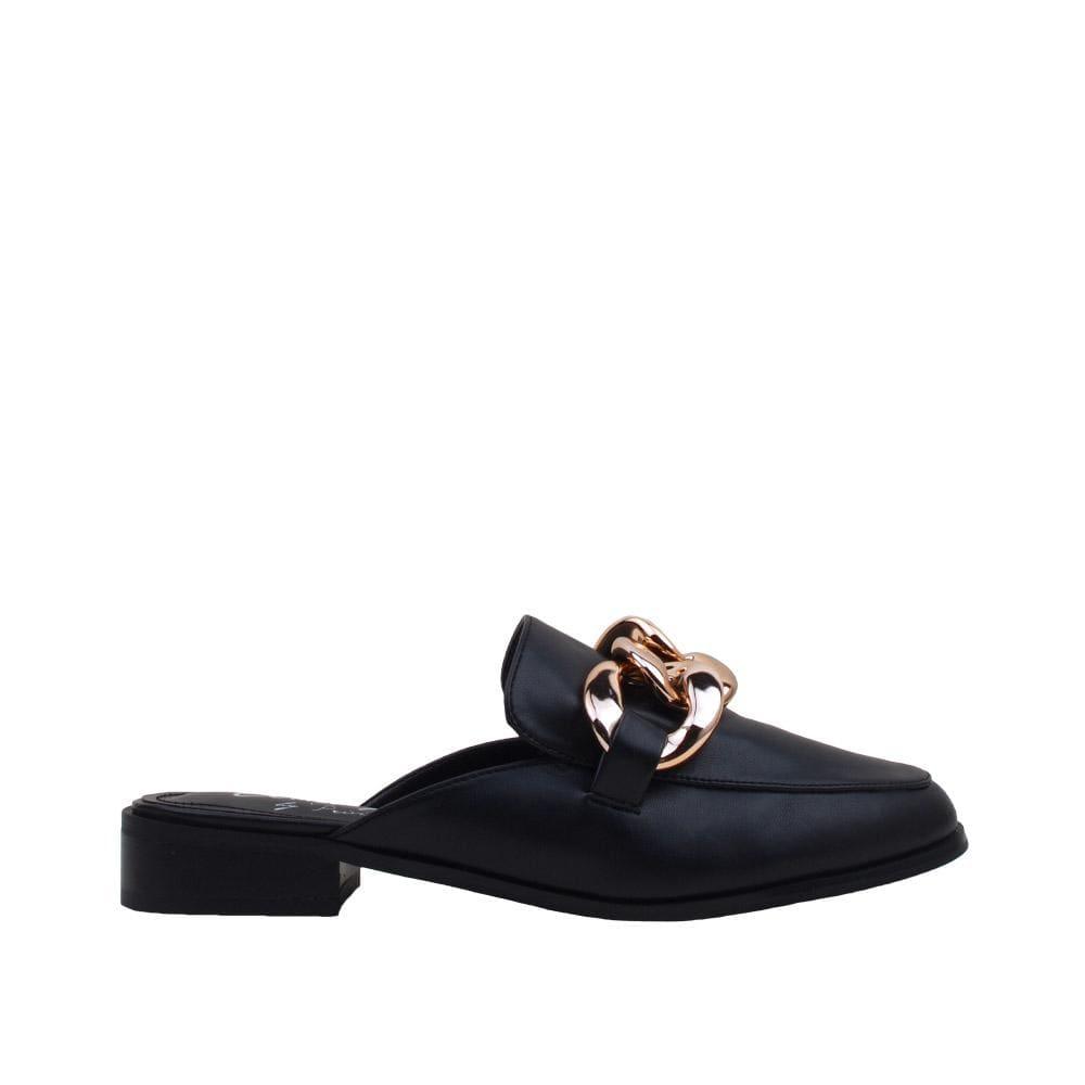 Black colored flat with golden chain upper and slip-on design.