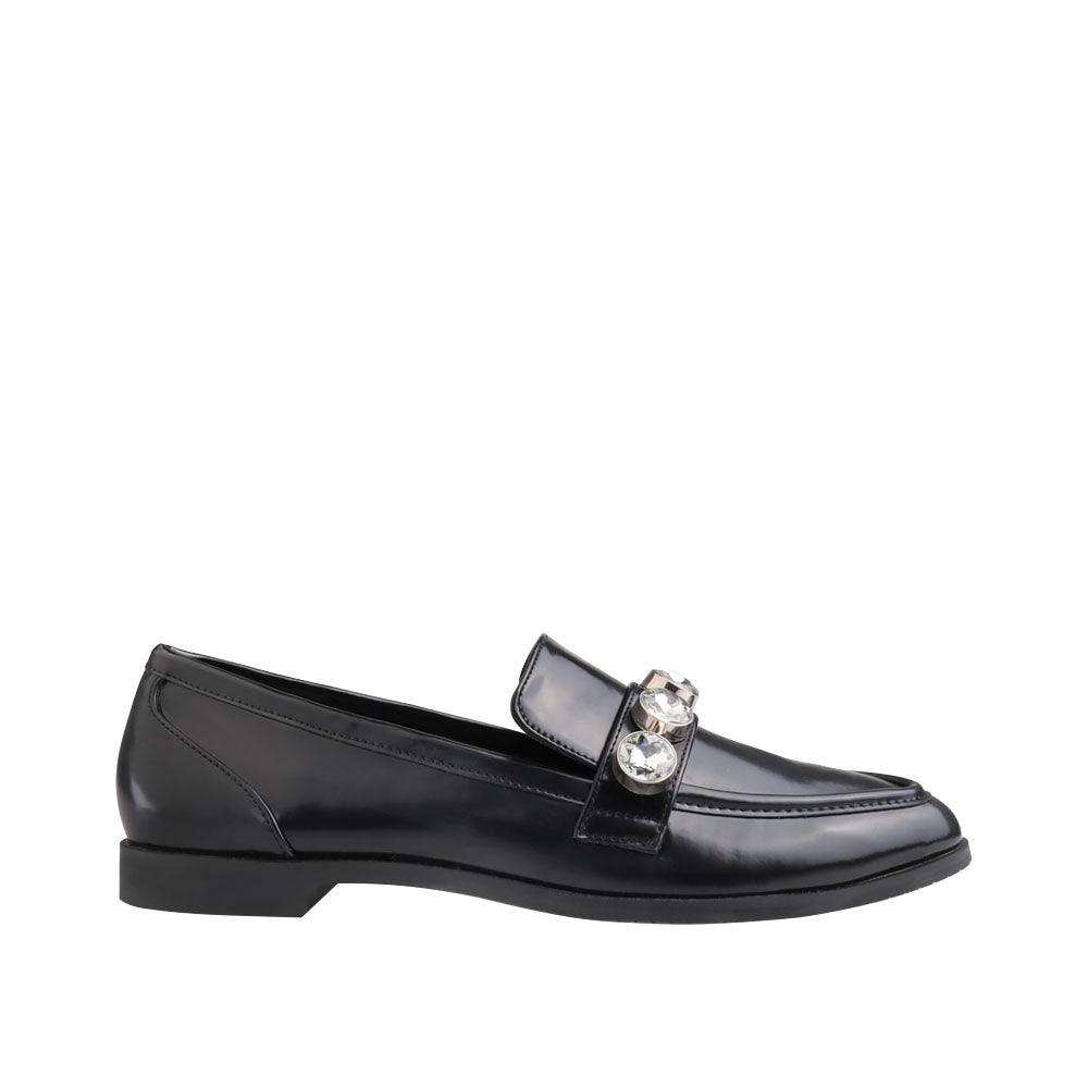 Slip-on black flats with rhinestone adornment on the upper.