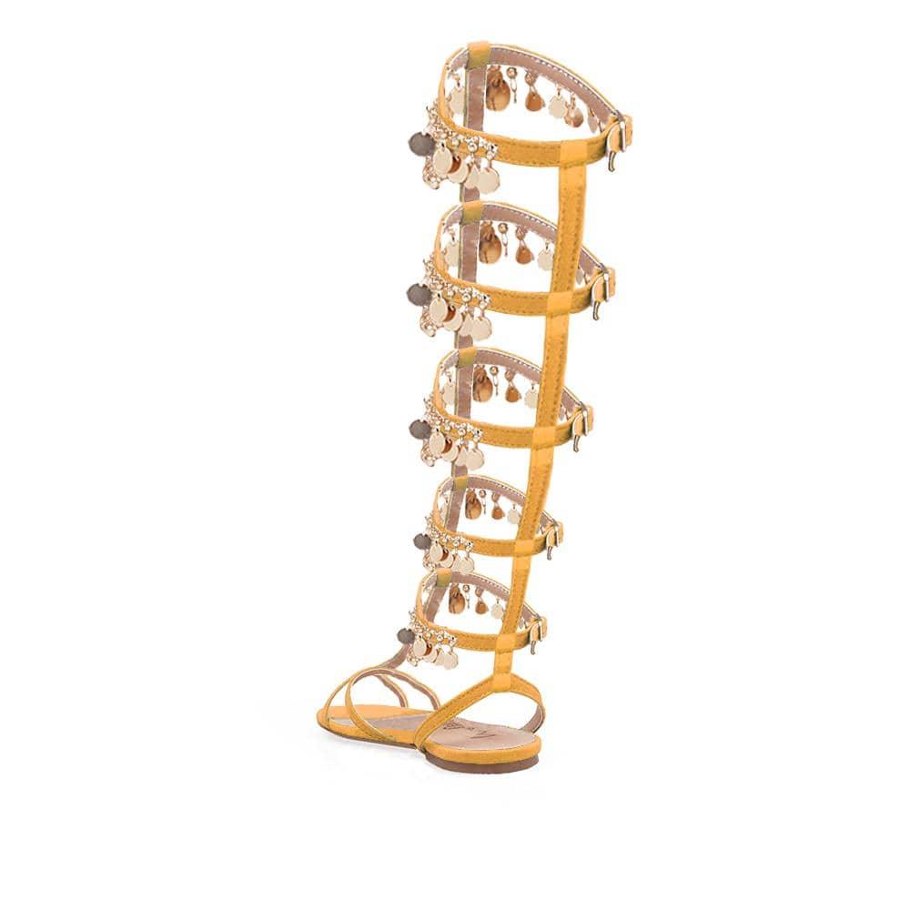 Knee high women's sandals with gold metallic chain and rhinestone accents in cognac-posterior view