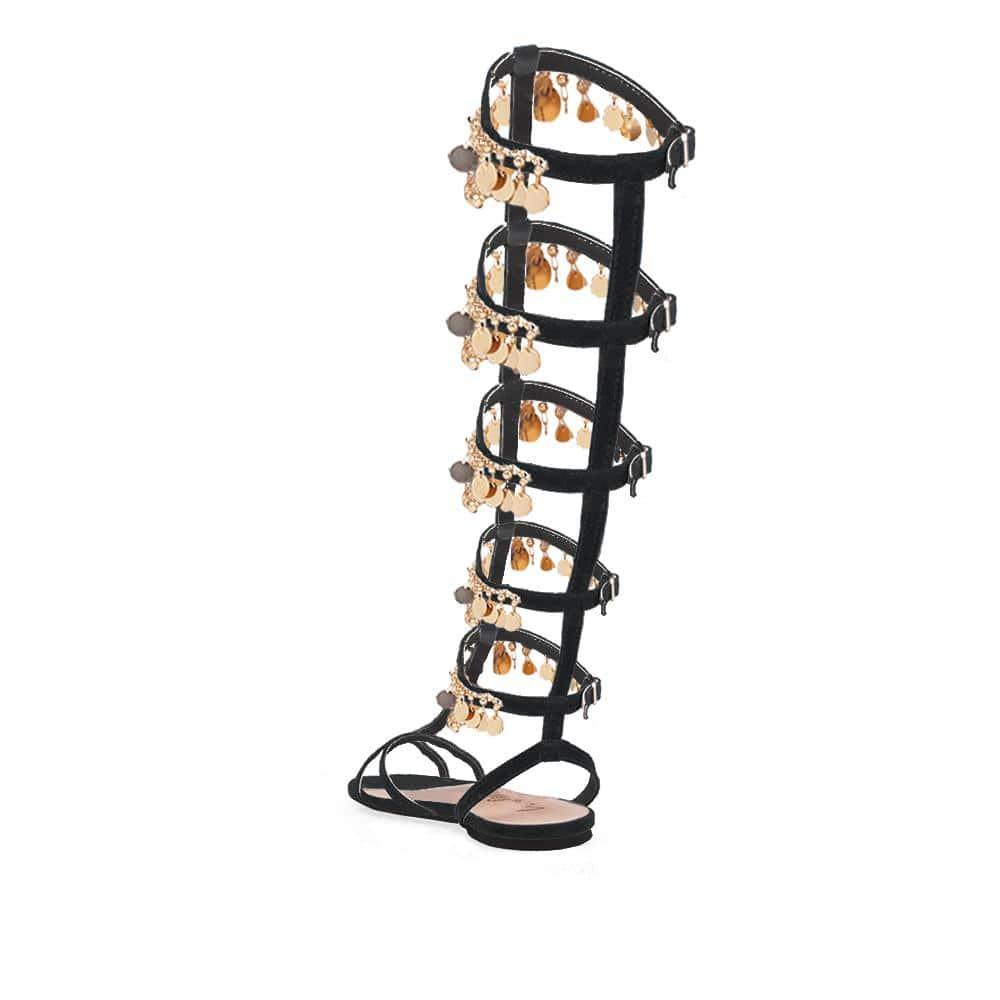 Knee high women's sandals with gold metallic chain and rhinestone accents in black-posterior view