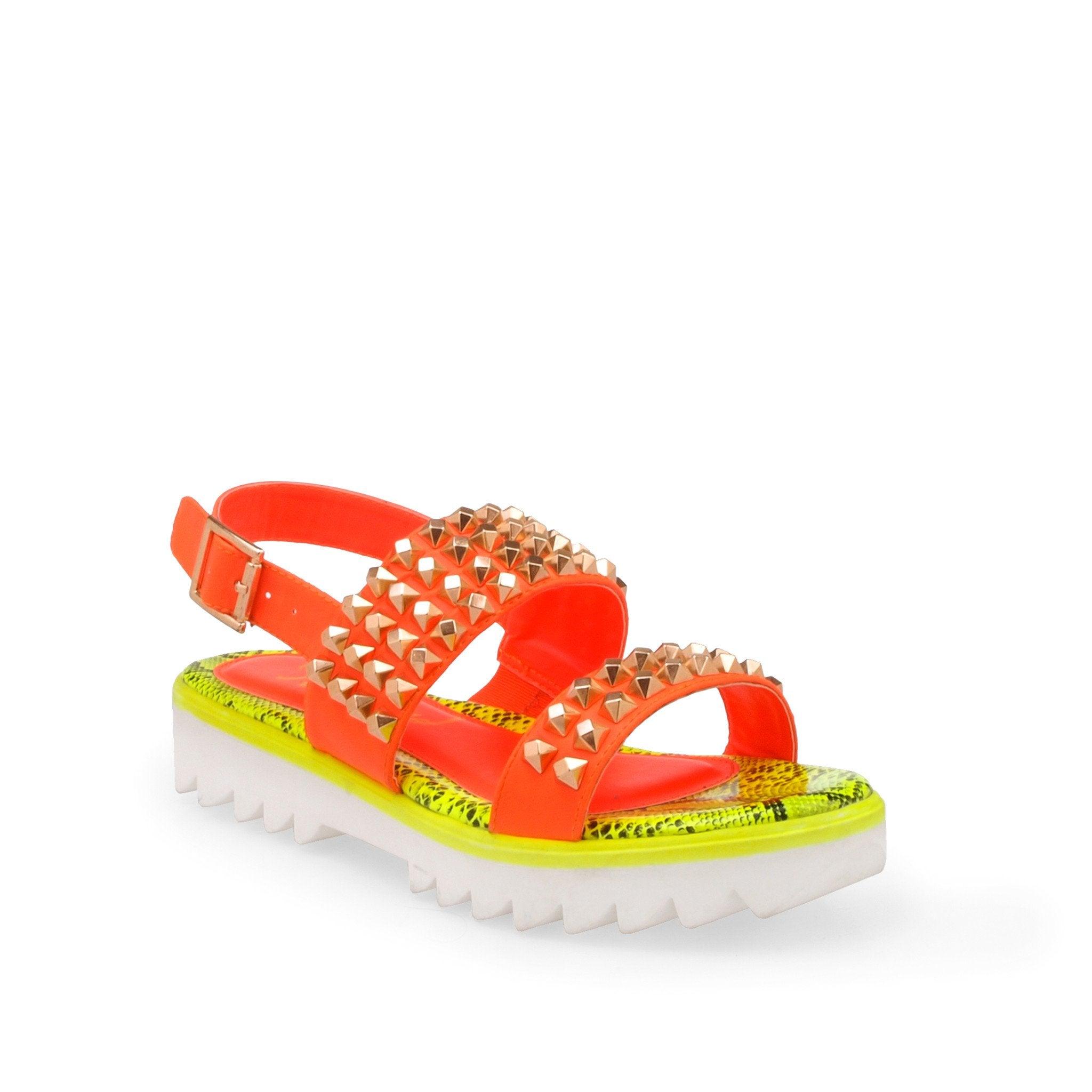 Neon orange leatherette women's slide on shoes with studs-corner view