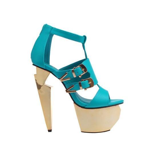 Platform heels in blue with side buckle design and rear zip clasp.