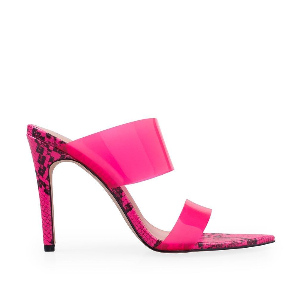 Fuchsia colored heels with snake pattern and translucent upper with slip on style