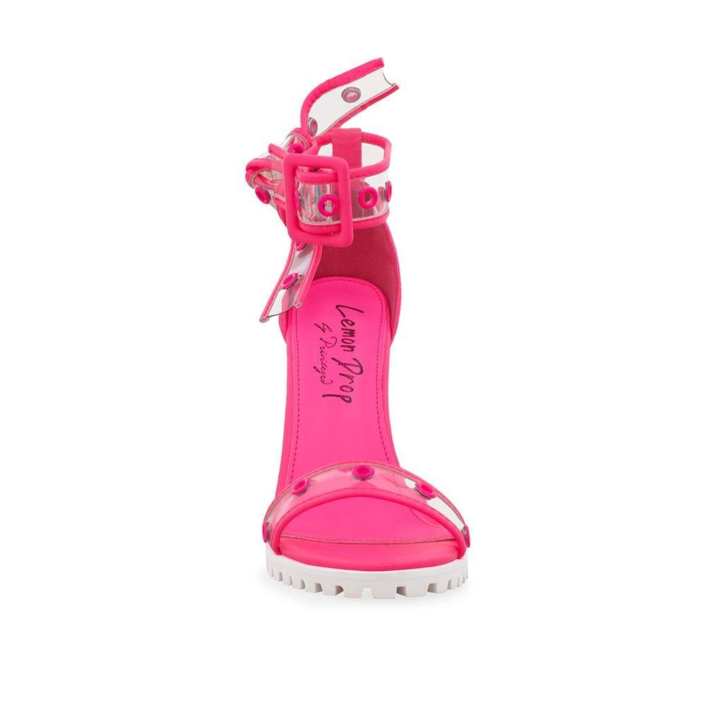 Neon pink women's heels with clear vinyl ankle straps-front view