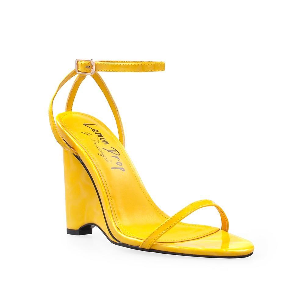 Vegan patent leather women's wedge heel in yellow-corner view